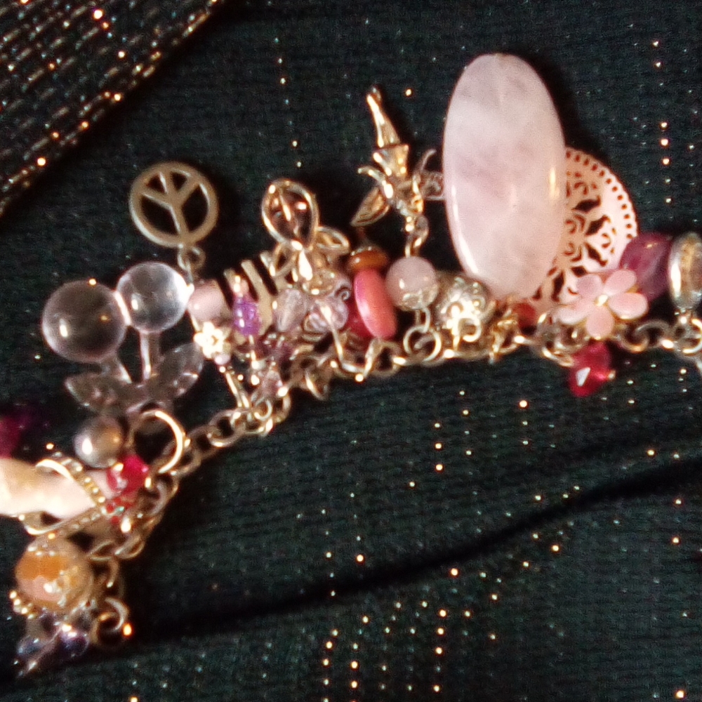 Charm bracelet pink beaded crystals and glass silver charms.